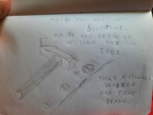 Image contents: A hammer on a dented board with screws that require a screwdriver. Caption: Maybe you don't lack discipline. Maybe you grew up without the tool that actually worked for your brain.